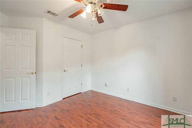 28 Raven Wood Way, Pooler, GA 31322 - unfurnished bedroom featuring visible vents, baseboards, ceiling fan, and wood finished floors