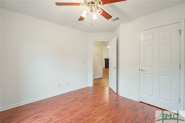 28 Raven Wood Way, Pooler, GA 31322 - unfurnished bedroom featuring visible vents, baseboards, ceiling fan, and wood finished floors