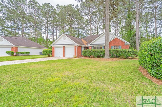 28 Raven Wood Way, Pooler, GA 31322 - ranch-style home with a garage, brick siding, driveway, and a front lawn