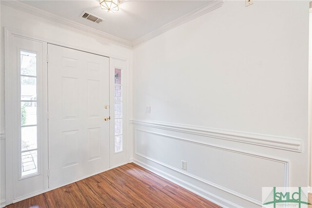28 Raven Wood Way, Pooler, GA 31322 - foyer featuring crown molding, wood finished floors, wainscoting, and visible vents