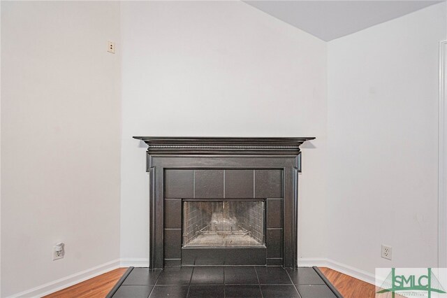28 Raven Wood Way, Pooler, GA 31322 - details featuring baseboards, wood finished floors, and a fireplace