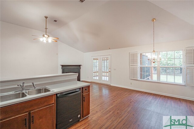 28 Raven Wood Way, Pooler, GA 31322 - kitchen featuring black dishwasher, wood finished floors, a sink, lofted ceiling, and open floor plan