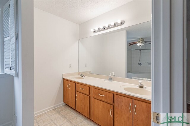 28 Raven Wood Way, Pooler, GA 31322 - full bathroom with a sink, a ceiling fan, a textured ceiling, an enclosed shower, and double vanity
