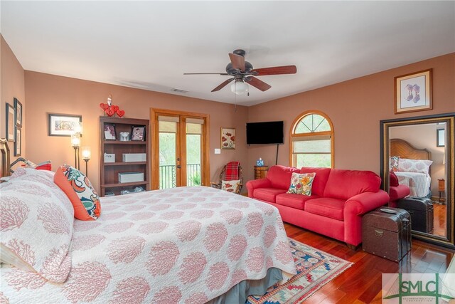 57 Delegal Rd, Savannah, GA 31411 - bedroom featuring access to outside, multiple windows, french doors, and wood finished floors