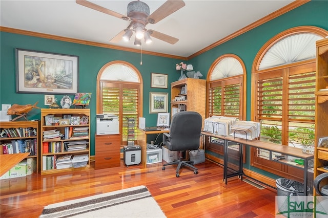 57 Delegal Rd, Savannah, GA 31411 - home office with a wealth of natural light, a ceiling fan, ornamental molding, and wood finished floors