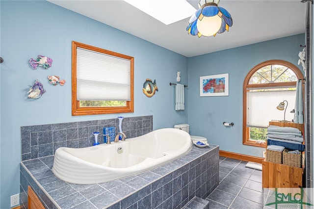 57 Delegal Rd, Savannah, GA 31411 - full bathroom with a bath, baseboards, and tile patterned flooring