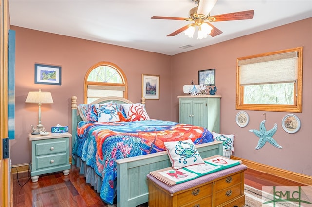 57 Delegal Rd, Savannah, GA 31411 - bedroom featuring visible vents, multiple windows, baseboards, and dark wood-style floors
