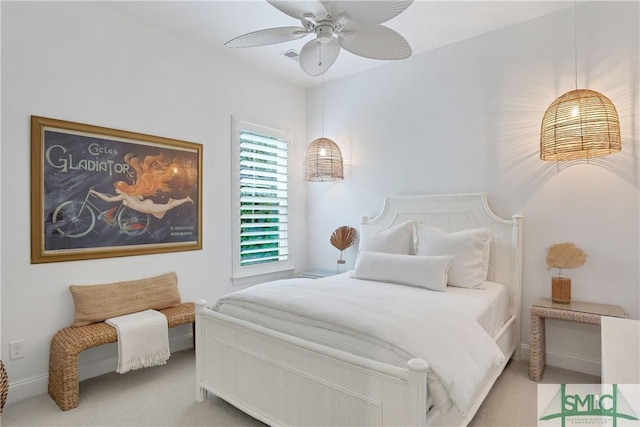 carpeted bedroom with ceiling fan
