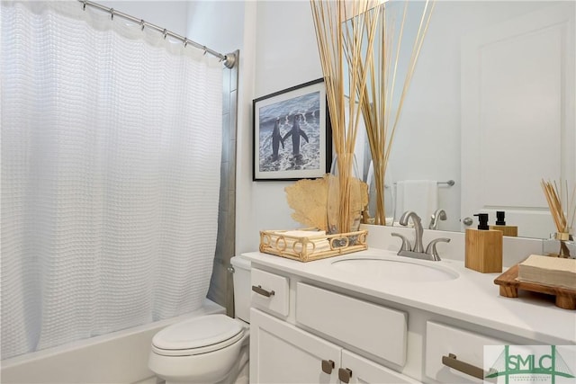 full bathroom with shower / tub combo, toilet, and vanity