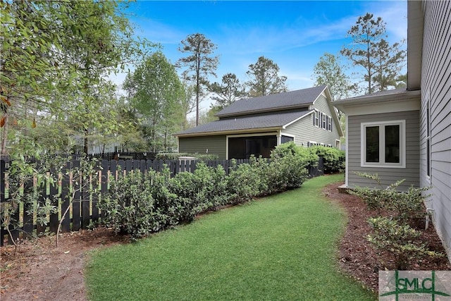 view of yard featuring fence