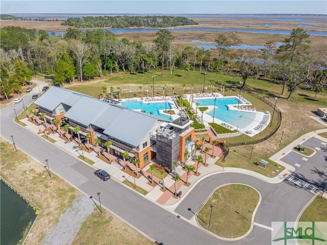 bird's eye view with a water view