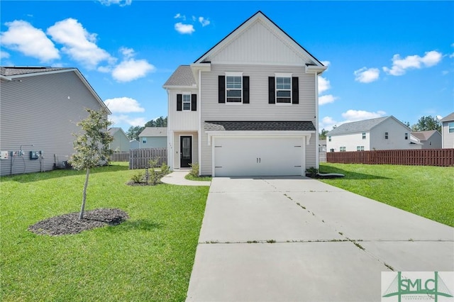 view of front of home with a front yard, a garage, board and batten siding, fence, and driveway