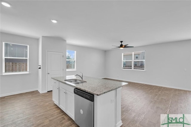 kitchen with white cabinetry, light wood-style floors, ceiling fan, stainless steel dishwasher, and a sink