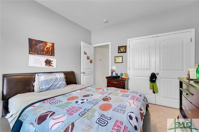bedroom with a closet and carpet floors