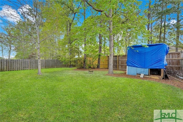 view of yard featuring a fenced backyard