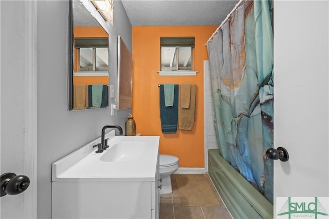 109 Seminole St, Savannah, GA 31406 - full bathroom with shower / tub combo, vanity, tile patterned floors, a textured ceiling, and toilet