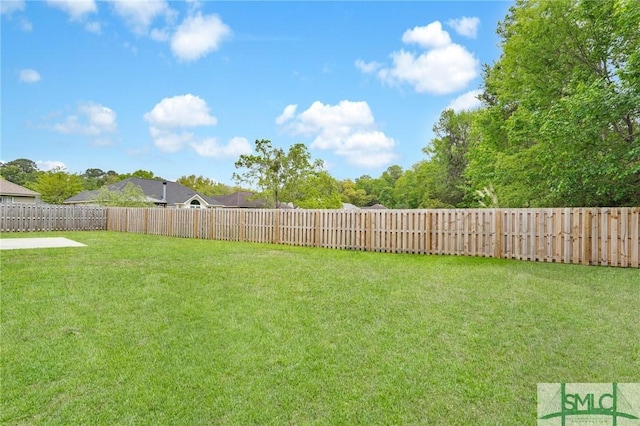 view of yard featuring a fenced backyard