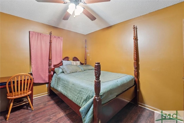 bedroom with a textured ceiling, wood finished floors, ceiling fan, and baseboards