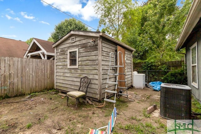 130 N Leeds Gate Rd, Savannah, GA 31406 - view of shed featuring central air condition unit and a fenced backyard