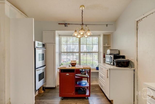 130 N Leeds Gate Rd, Savannah, GA 31406 - kitchen with open shelves, wood finished floors, stainless steel appliances, light countertops, and white cabinetry