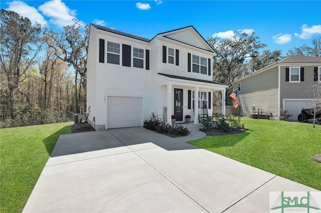 traditional-style home with a porch, a garage, concrete driveway, and a front lawn