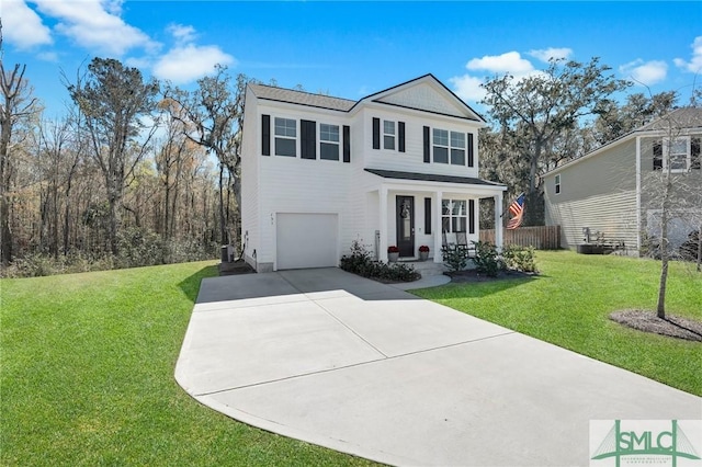 view of front of property featuring a front yard, an attached garage, covered porch, fence, and concrete driveway