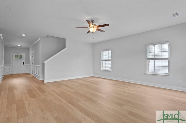 unfurnished living room featuring baseboards, recessed lighting, a ceiling fan, light wood-style floors, and visible vents