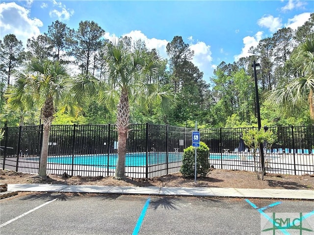 community pool with fence