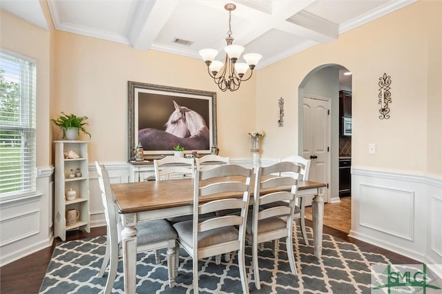 dining area featuring visible vents, beam ceiling, a notable chandelier, and dark wood finished floors
