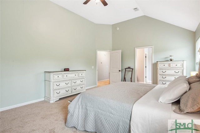 bedroom with high vaulted ceiling, baseboards, visible vents, and carpet floors