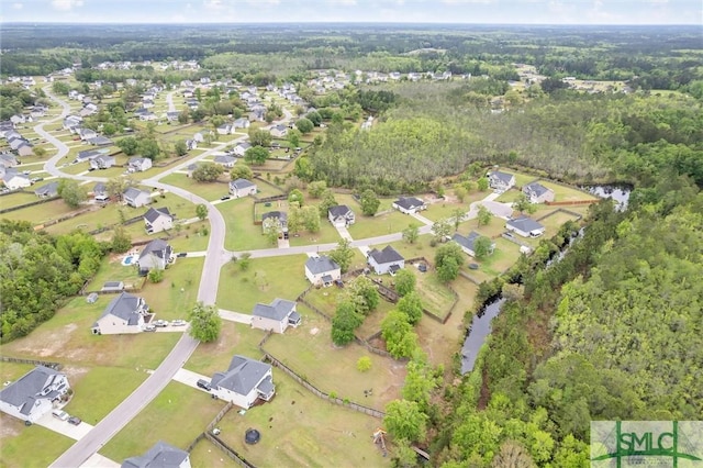 aerial view with a view of trees and a residential view