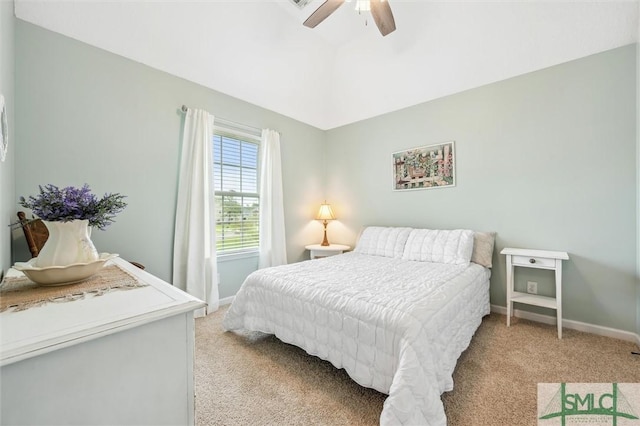 bedroom featuring baseboards, ceiling fan, and light colored carpet