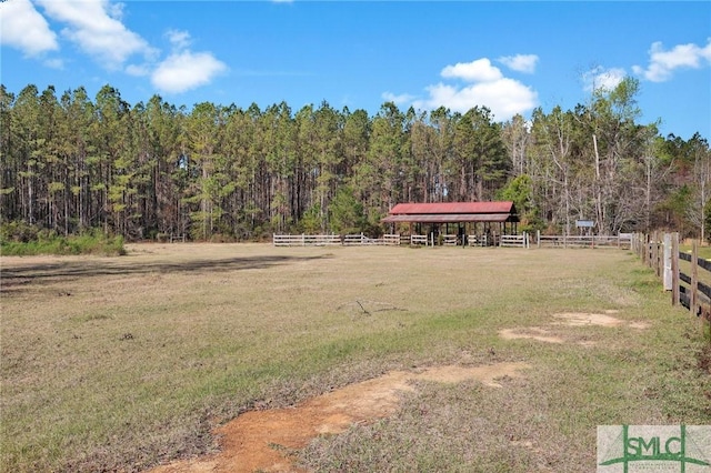 1505 Wilson Rd, Brooklet, GA 30415 - view of yard with fence, a view of trees, and an enclosed area