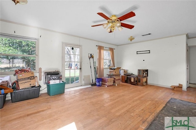 1505 Wilson Rd, Brooklet, GA 30415 - miscellaneous room featuring visible vents, ornamental molding, ceiling fan, and wood finished floors