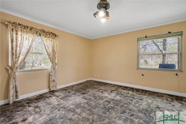 1505 Wilson Rd, Brooklet, GA 30415 - unfurnished room with crown molding, baseboards, a ceiling fan, and a textured ceiling