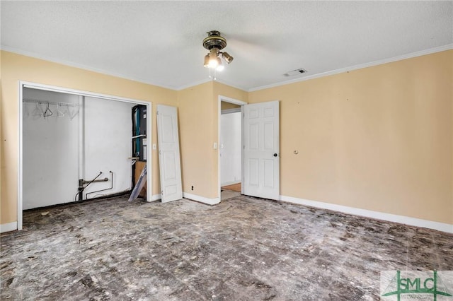 1505 Wilson Rd, Brooklet, GA 30415 - unfurnished bedroom featuring crown molding, baseboards, visible vents, and a textured ceiling