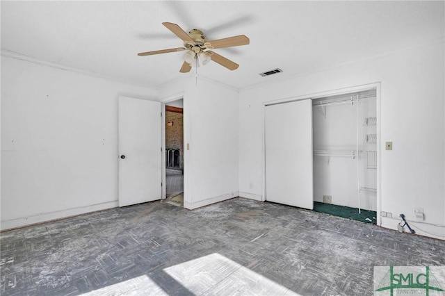 1505 Wilson Rd, Brooklet, GA 30415 - unfurnished bedroom featuring visible vents, tile patterned floors, a closet, and ceiling fan