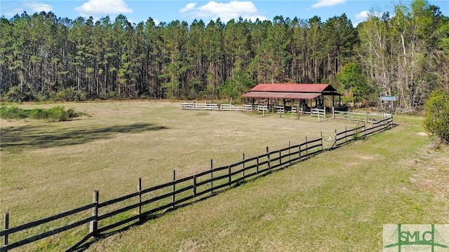 1505 Wilson Rd, Brooklet, GA 30415 - view of community featuring a wooded view, a rural view, an exterior structure, and an outbuilding