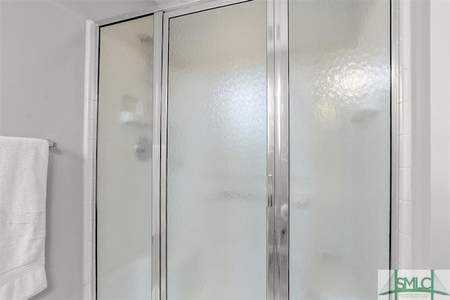 bathroom featuring a stall shower