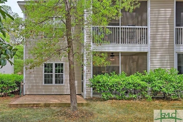 rear view of house with a balcony