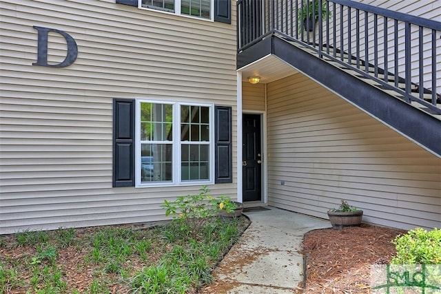 doorway to property with a balcony