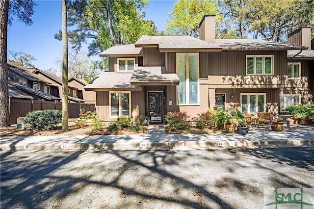 69 Brown Pelican Dr, Savannah, GA 31419 - multi unit property featuring a patio area, french doors, fence, and a chimney