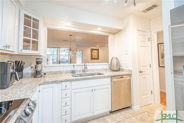 69 Brown Pelican Dr, Savannah, GA 31419 - kitchen with range, glass insert cabinets, visible vents, dishwasher, and a sink