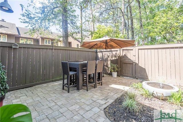 69 Brown Pelican Dr, Savannah, GA 31419 - view of patio / terrace with a fenced backyard and outdoor dining area