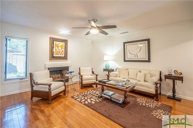 69 Brown Pelican Dr, Savannah, GA 31419 - living room featuring ornamental molding, visible vents, and light wood-style floors