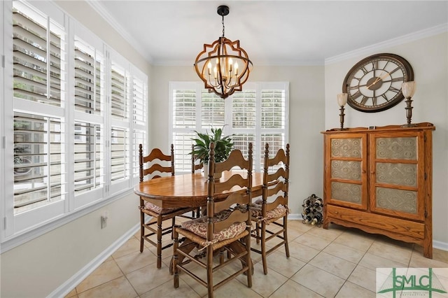 dining room with crown molding, light tile patterned floors, baseboards, and an inviting chandelier