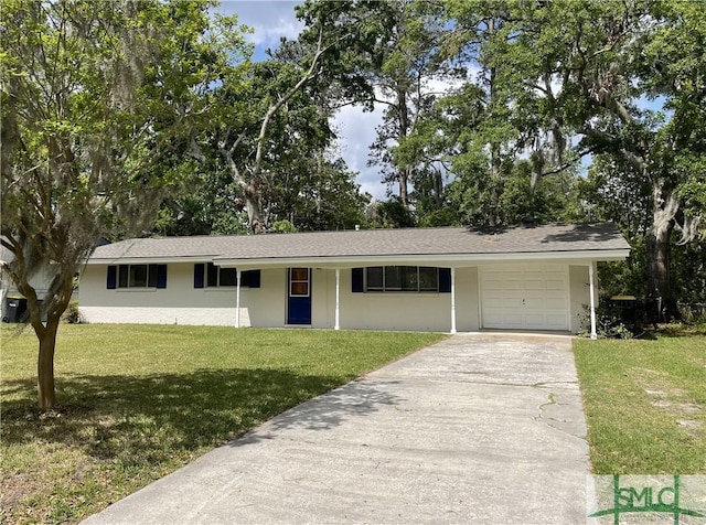 12509 Woodley Rd, Savannah, GA 31419 - ranch-style home featuring a garage, a front yard, driveway, and stucco siding