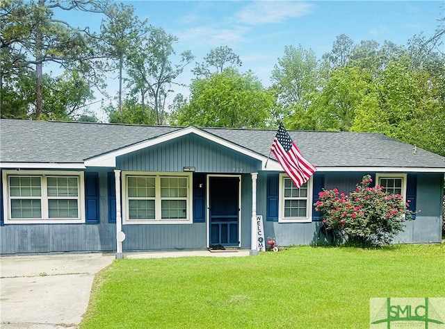 712 Fleming Rd, Hinesville, GA 31313 - ranch-style home featuring a front yard and a shingled roof