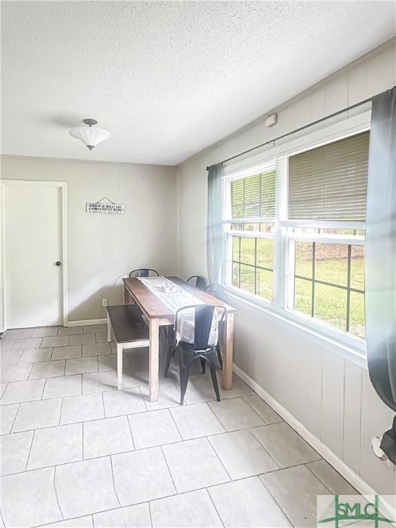 712 Fleming Rd, Hinesville, GA 31313 - interior space with a textured ceiling, baseboards, and light tile patterned flooring