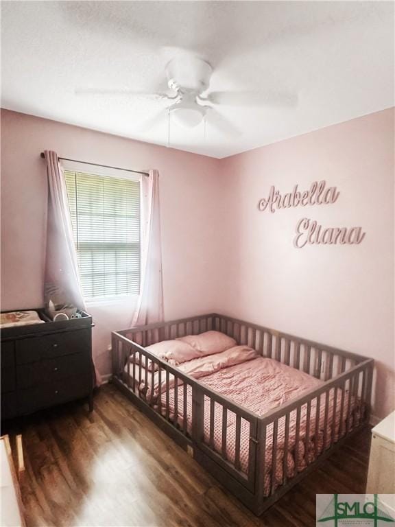 712 Fleming Rd, Hinesville, GA 31313 - bedroom with ceiling fan and wood finished floors